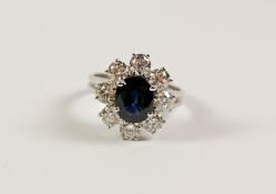 Oval sapphire and round brilliant cut diamond cluster white gold ring hallmarked 18ct - sapphire