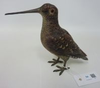 A large cold painted bronze sculpture of a snipe,