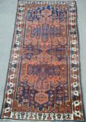 Persian Baktihari long carpet, with two cruciform medallions,