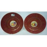 Pair of Royal Worcester plates with hand-painted panels of fruit by J.