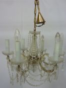 Six branch cut glass chandelier and three matching wall lights with extra drops