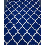 Rajasthan blue ground geometric quatrefoil rug,