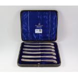 Set of six pistol grip tea knives with hallmarked silver blades and handles by Harrison Bros &
