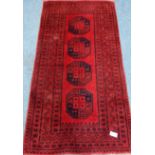 Afghan Bokhara red ground rug, 106cm x 197cm Condition Report <a href='//www.