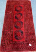 Afghan Bokhara red ground rug, 106cm x 197cm Condition Report <a href='//www.