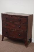 Early 19th century mahogany bow front chest fitted with three graduating drawers,
