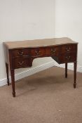 20th century mahogany serpentine front knee hole desk, fitted with five drawers,
