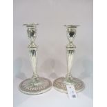 Pair of Adam style silver candlesticks by Hayes & Co Birmingham 1912 with detachable sconces 29cm