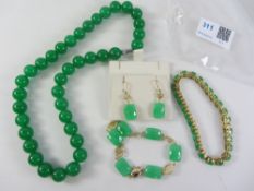 Modern jade bracelet and matching pair ear-rings stamped 14k,
