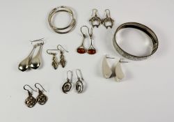 Eight pairs ear-rings stamped 925 and a hinged silver bangle stamped std silver Condition