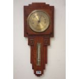 Art Deco period oak aneroid barometer, with mercury thermometer,