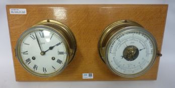 Schatz ship's brass plated clock with striking movement and matching barometer with thermometer on