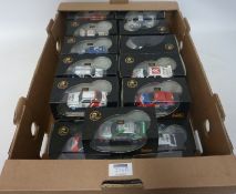 A collection of Ixo Diecast model rally cars in display cases in one box Condition