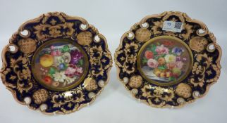 Pair of 19th century plates finely hand-painted with still lifes of flowers and fruit,