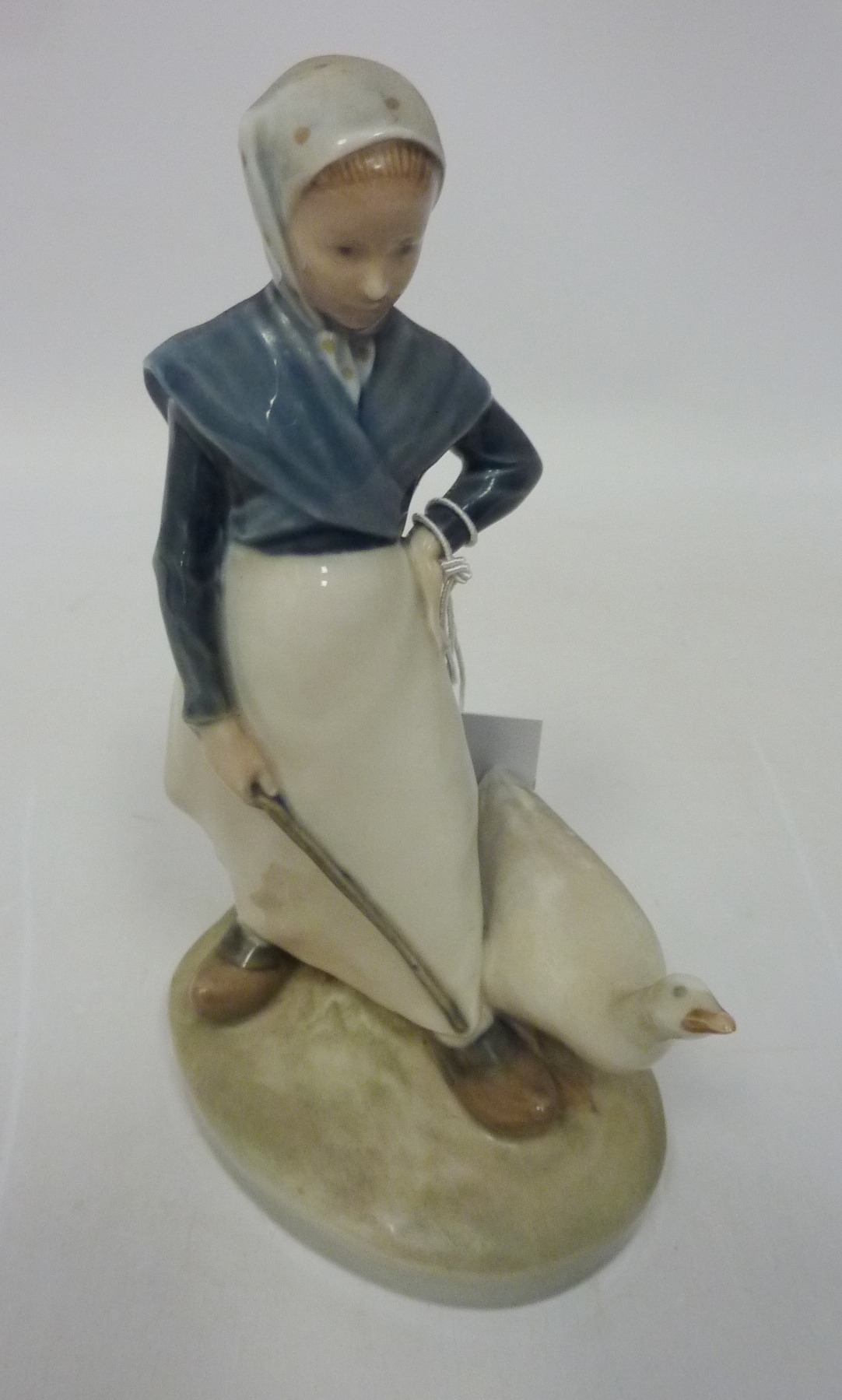 Royal Copenhagen goose girl figure, No. 829, H 18.