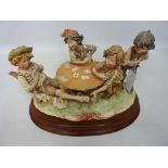 A large size Capodimonte figure group 'The Cheats boy card players' W39cm including plinth