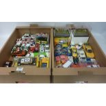 Two model vehicle Dioramas and a collection of various Diecast model rally cars in two boxes