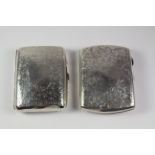 Two silver cigarette cases scroll and leaf decoration 1911 and 1914 approx 5oz Condition