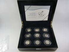Set of eighteen Diamond wedding anniversary silver proof crowns cased Condition Report