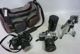 Canon A-1 camera including extra lenses, bag,