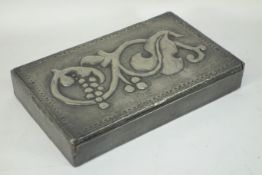 Hand beaten pewter box, embossed floral decoration to lid, W21cm H3.