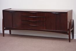 Swedish vintage retro teak and rosewood sideboard fitted with double cupboard either side and four