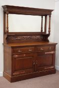 Arts & Crafts period oak bevelled mirror back sideboard fitted with two drawers and two cupboards