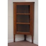 Yorkshire oak - 'Foxman' corner cabinet enclosed by single three glazed panel door,