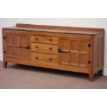 Yorkshire oak - 'Rabbitman' panelled sideboard fitted with three drawers with cupboards either side