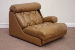 1970s Danish De Sede type modular armchair upholstered in tan leather, double retractable arm rests,