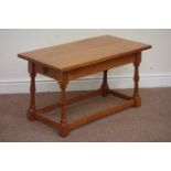 Yorkshire oak - rectangular coffee table on turned base connected by stretchers,