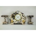 A French Art Deco marble mantle clock and garniture, signed Alger, Fort 35 Rue Michelet ,