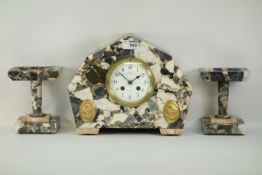 A French Art Deco marble mantle clock and garniture, signed Alger, Fort 35 Rue Michelet ,
