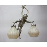 Early 20th century chrome plated cherub light fitting with striped onion glass shades,