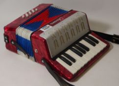 'Chamoon' piano accordion with red marble effect,
