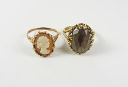 Cameo gold ring and a smokey quartz gold ring hallmarked 9ct Condition Report