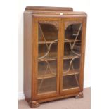 Mid 20th century carved oak display cabinet enclosed by two astragal glazed doors, W90cm, H140cm,