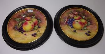 Pair of Coalport plates painted with fruit signed by Richard Budd, D27.