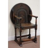 Early 20th century oak Monks bench/armchair, circular folding top,