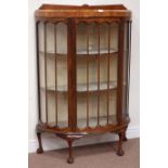 Early 20th century walnut bow front display cabinet raised on ball and claw feet, W90cm, H133cm,