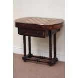 Early 19th century rosewood games table raised on double stretcher base,