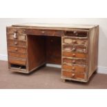 19th century pine twin pedestal desk fitted with fifteen drawers, W137cm, H83cm,