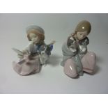 Two Lladro figurines - 'Who's the Fairest' No. 5468 and 'Snuggle Up' No. 6226, H 16.