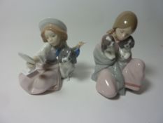 Two Lladro figurines - 'Who's the Fairest' No. 5468 and 'Snuggle Up' No. 6226, H 16.