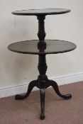 George III mahogany two tier dumb-waiter, raised on tripod base,