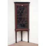 Early 20th century mahogany corner display cabinet, enclosed by single astragal glazed door,