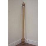 Early 20th century waxed pine curtain pole, with turned finials,