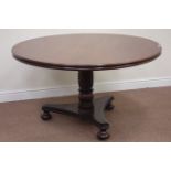 Regency mahogany circular top dining table turned rope twist pedestal on trifoil base with three