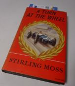 Books - Stirling Moss 'A Turn At The Wheel' 1961, signed by Stirling Moss.