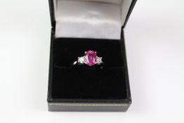 Oval pink sapphire and diamond three stone white gold ring hallmarked 18ct Condition